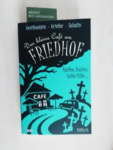 Mehr über den Artikel erfahren Das kleine Café am Friedhof – Gina Greifenstein